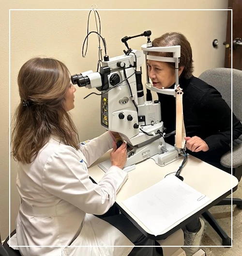 Dr. Sayani doing eye exam