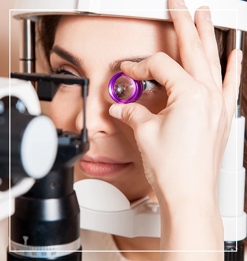 closeup portrait of beauty young brunette checks the vision at the clinic. Ophthalmologist.